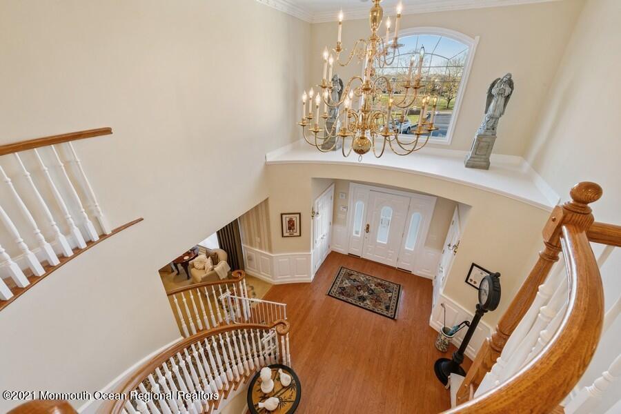179 Stone Hill Road Colts Neck, NJ 07722 - Photo 40 of 57 a view of a livingroom with furniture and staircase