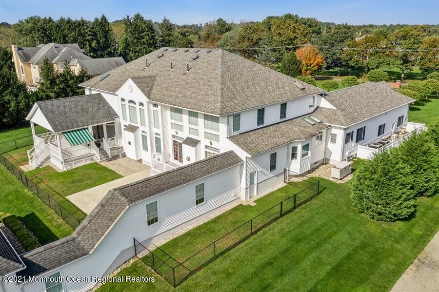 179 Stone Hill Road Colts Neck, NJ 07722 - Photo 4 of 57 an aerial view of a house with a big yard