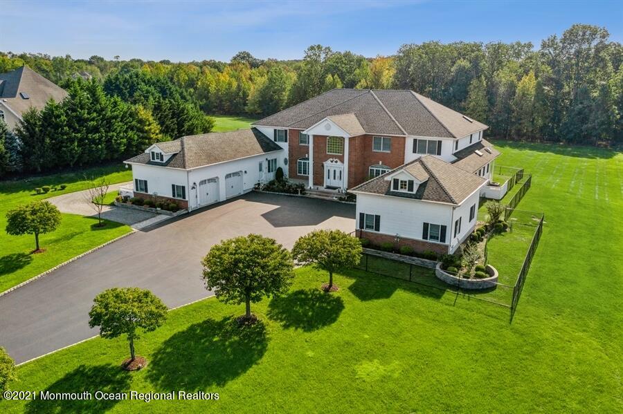 179 Stone Hill Road Colts Neck, NJ 07722 - Photo 53 of 57 an aerial view of a house