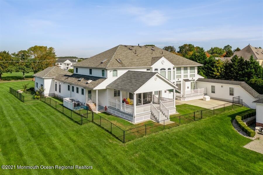 179 Stone Hill Road Colts Neck, NJ 07722 - Photo 7 of 57 a aerial view of a house with a big yard