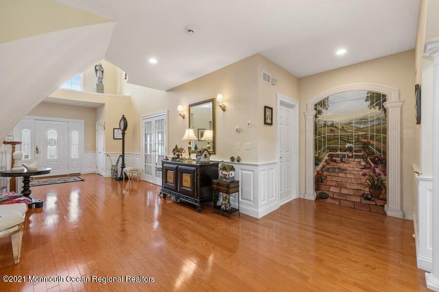 179 Stone Hill Road Colts Neck, NJ 07722 - Photo 10 of 57 a view of a living room and dining room