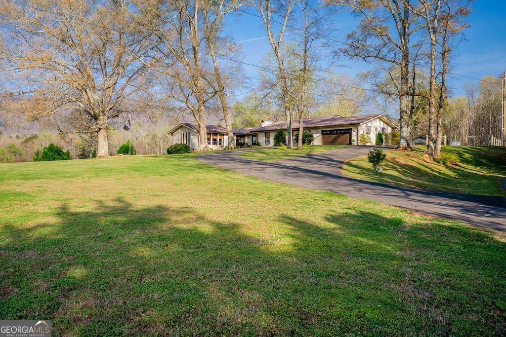 1254 Mountain Loop Road Northwest Sugar Valley, GA 30746 - Photo 3 of 77 Gallery Image 3
