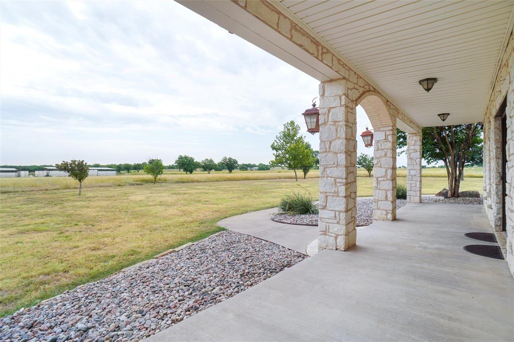 13340 John Day Road Haslet, TX 76052 - Photo 26 of 30 a view of a lake with a big yard