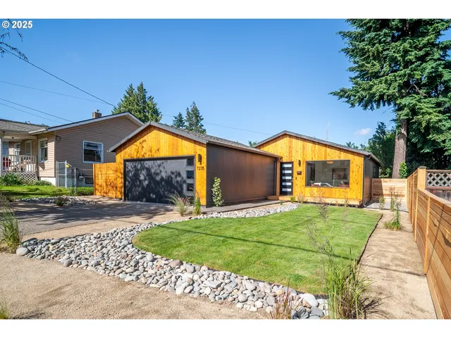 a view of outdoor space and front view of a house