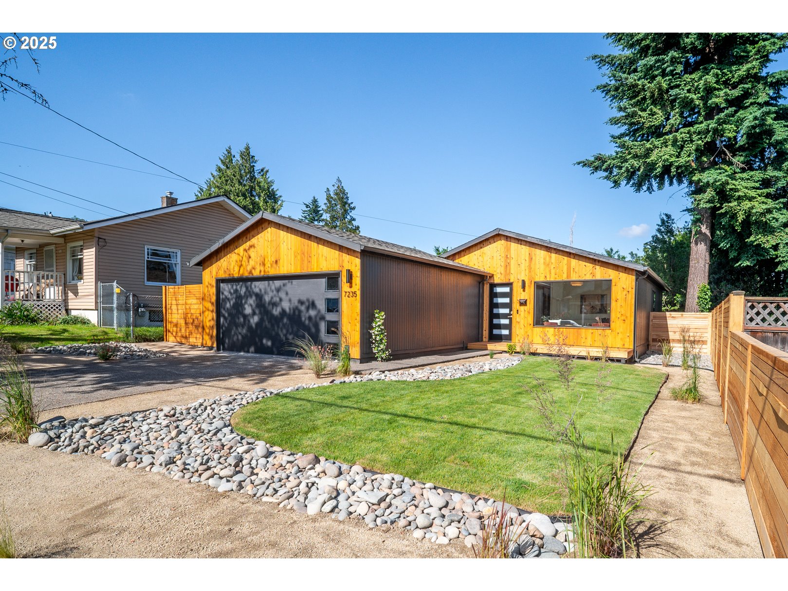 7235 Northeast 9th Avenue Portland, OR 97211 - Photo 1 of 22 a view of outdoor space and front view of a house