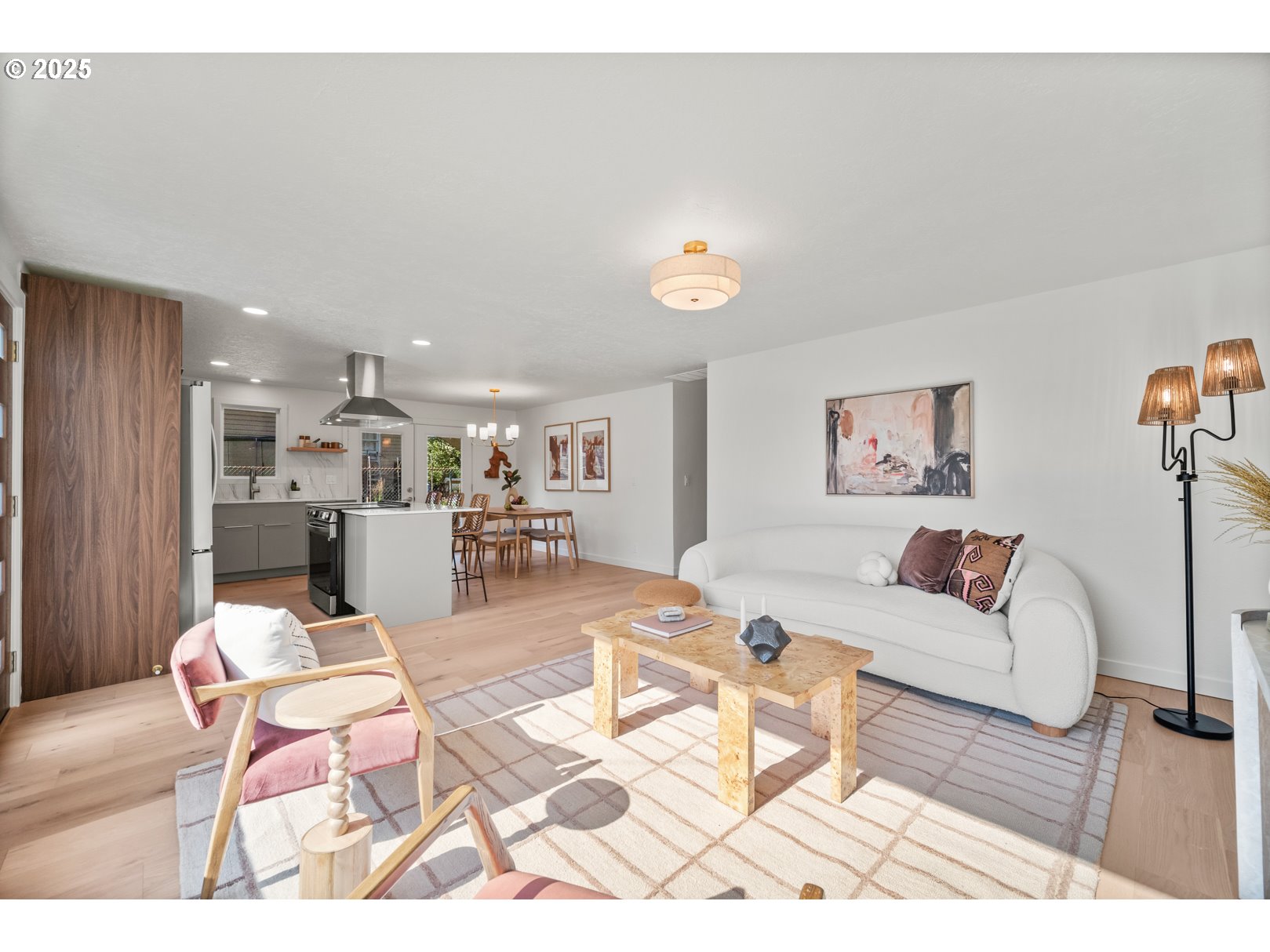 7235 Northeast 9th Avenue Portland, OR 97211 - Photo 11 of 22 a living room with furniture and kitchen view
