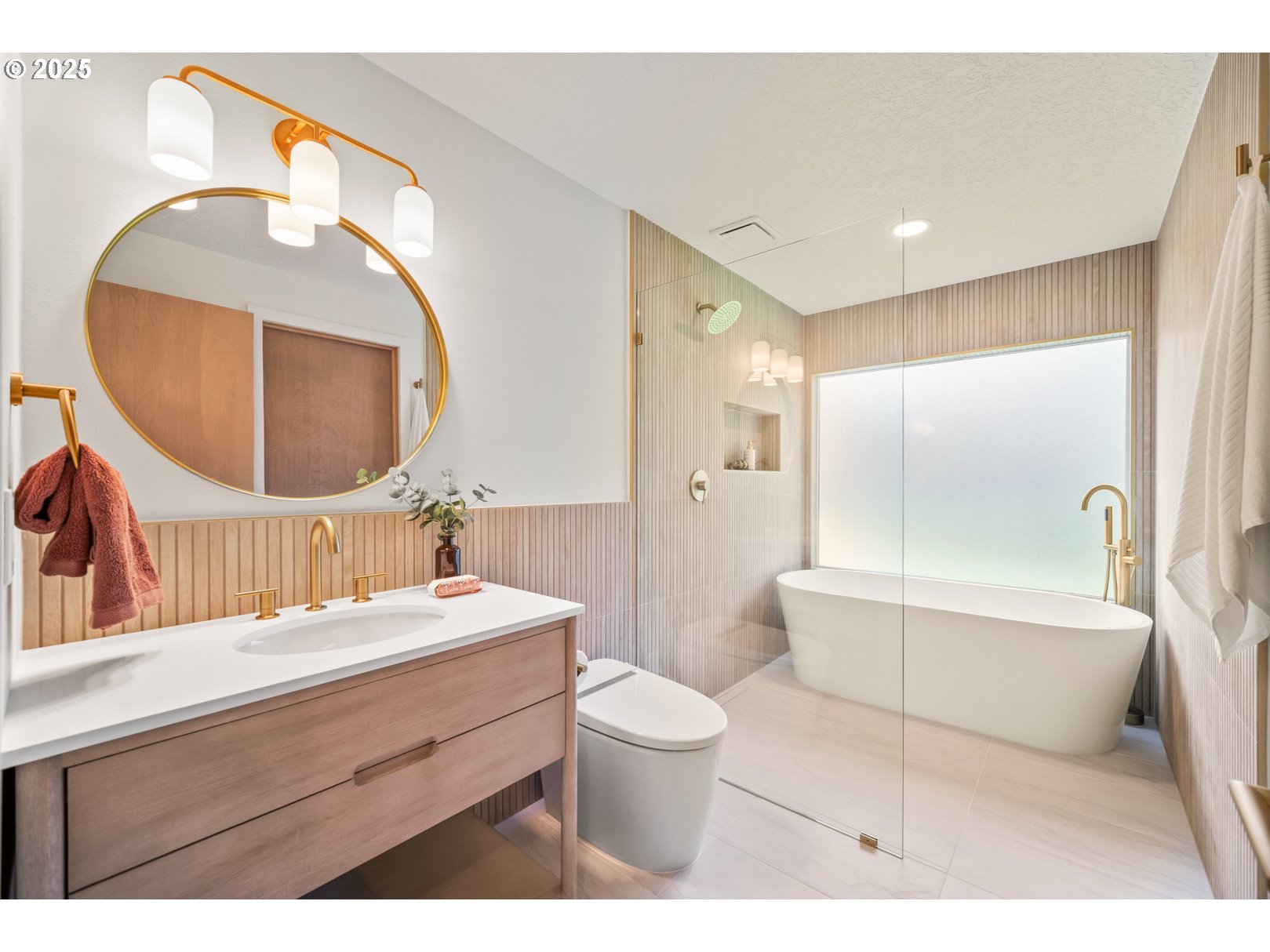 7235 Northeast 9th Avenue Portland, OR 97211 - Photo 12 of 22 a bathroom with a sink a toilet and a mirror