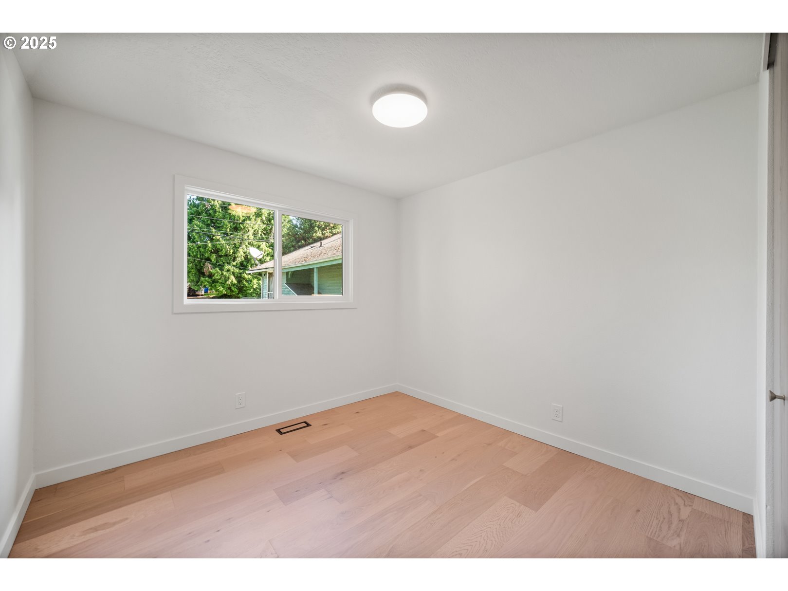 7235 Northeast 9th Avenue Portland, OR 97211 - Photo 18 of 22 a view of empty room with window