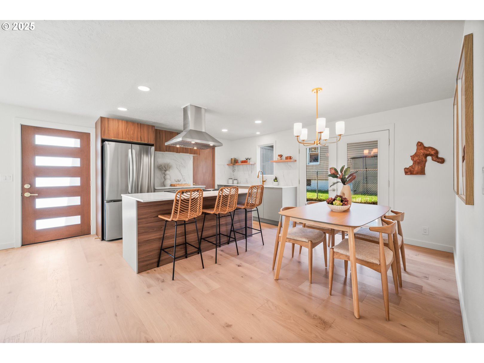 7235 Northeast 9th Avenue Portland, OR 97211 - Photo 9 of 22 a dining room with furniture and wooden floor
