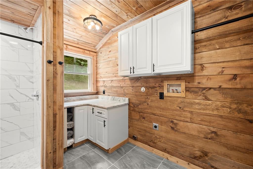 587 Cold Stream Trail Jasper, GA 30143 - Photo 19 of 41 a bathroom with a sink and a mirror