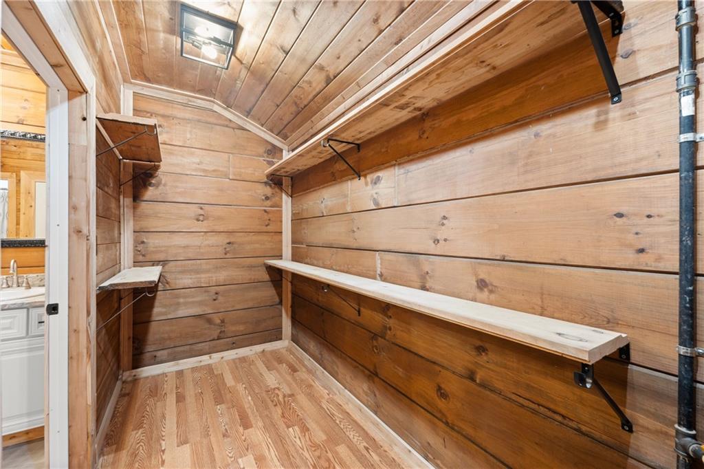 587 Cold Stream Trail Jasper, GA 30143 - Photo 24 of 41 a view of a balcony with wooden floor