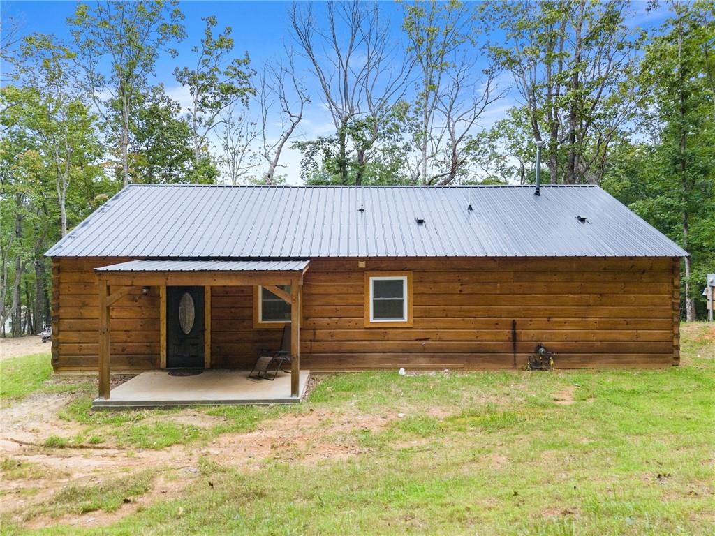 587 Cold Stream Trail Jasper, GA 30143 - Photo 30 of 41 a front view of a house with a yard