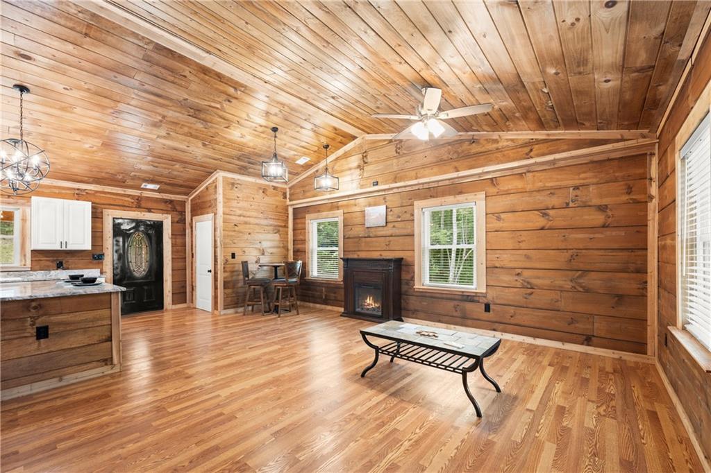 587 Cold Stream Trail Jasper, GA 30143 - Photo 3 of 41 a outdoor space with lots of furniture and a chandelier