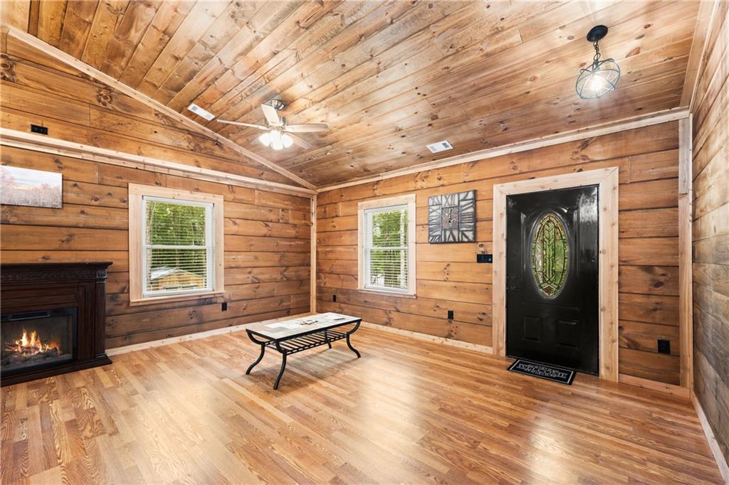 587 Cold Stream Trail Jasper, GA 30143 - Photo 4 of 41 a living room with furniture and a fireplace