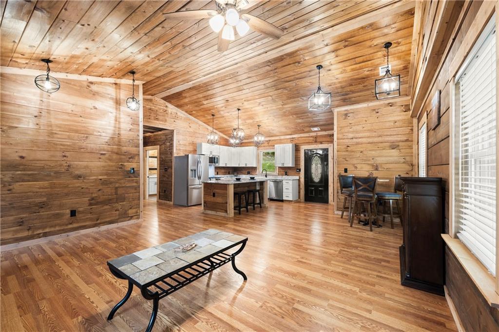 587 Cold Stream Trail Jasper, GA 30143 - Photo 6 of 41 a outdoor space with lots of furniture and wooden floor