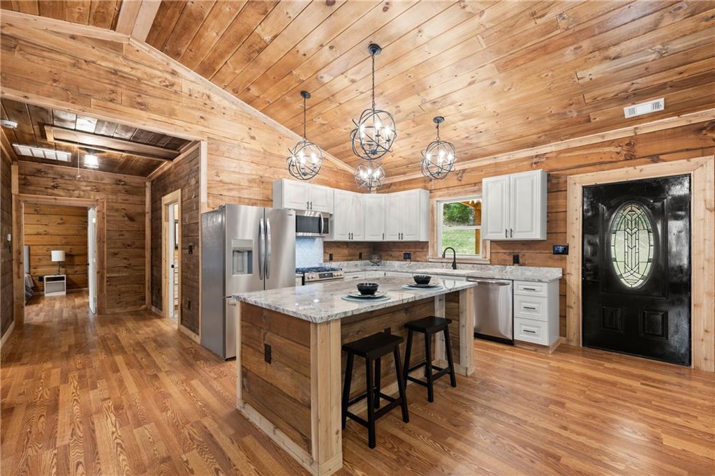 587 Cold Stream Trail Jasper, GA 30143 - Photo 9 of 41 a kitchen with a sink and cabinets