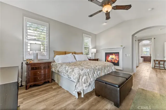 a large bathroom with a double vanity sink large mirror and a bathtub