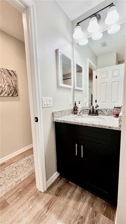 13486 English Sparrow Road Weeki Wachee, FL 34614 - Photo 30 of 51 a kitchen with a sink and a mirror