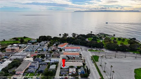 a aerial view of a house with a lake view
