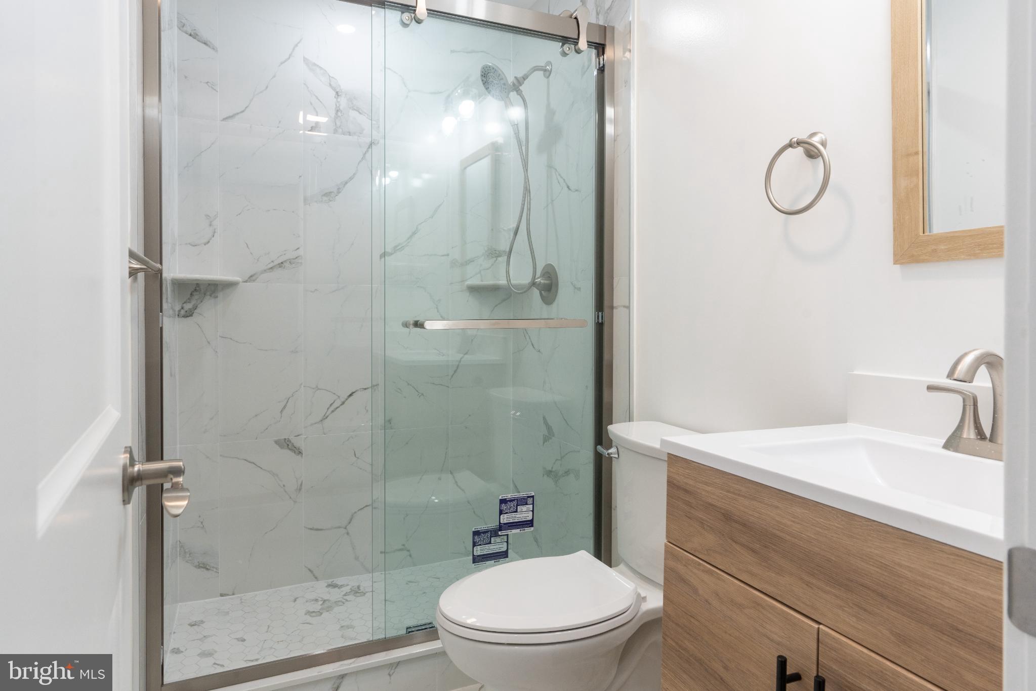 3631 Warren Street Philadelphia, PA 19104 - Photo 20 of 27 Modern bathroom with sleek glass shower.