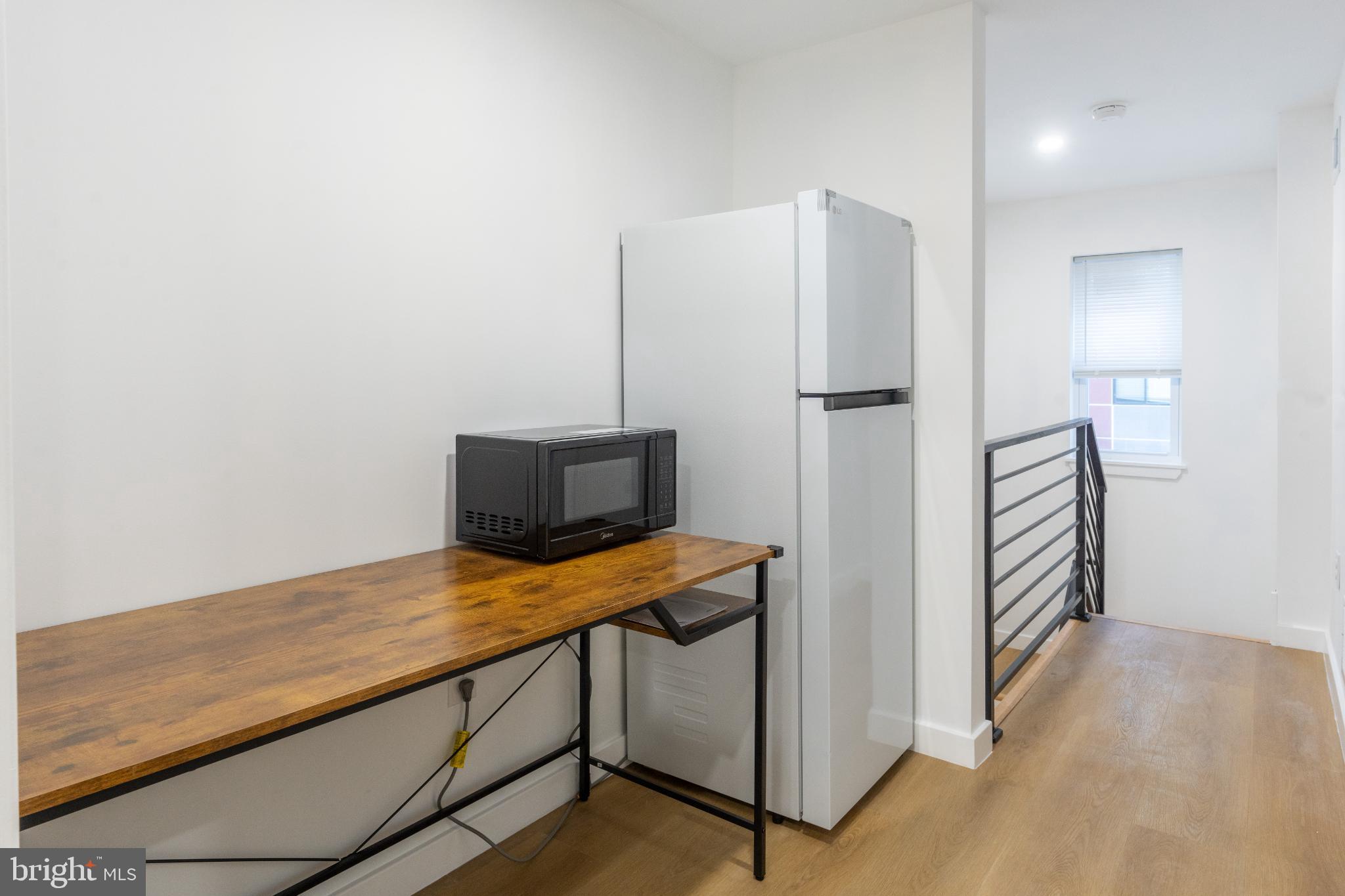 3631 Warren Street Philadelphia, PA 19104 - Photo 25 of 27 Modern kitchen nook with sleek appliances.