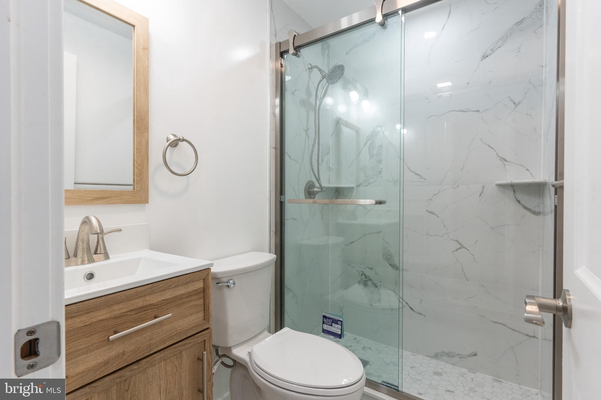 3631 Warren Street Philadelphia, PA 19104 - Photo 3 of 27 Modern bathroom with sleek glass shower.