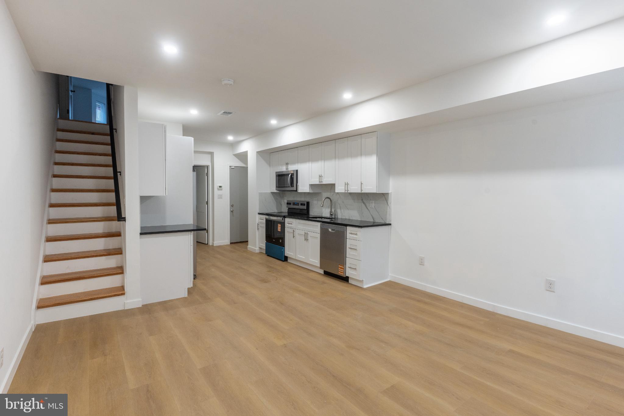 3631 Warren Street Philadelphia, PA 19104 - Photo 6 of 27 Modern kitchen with sleek finishes.