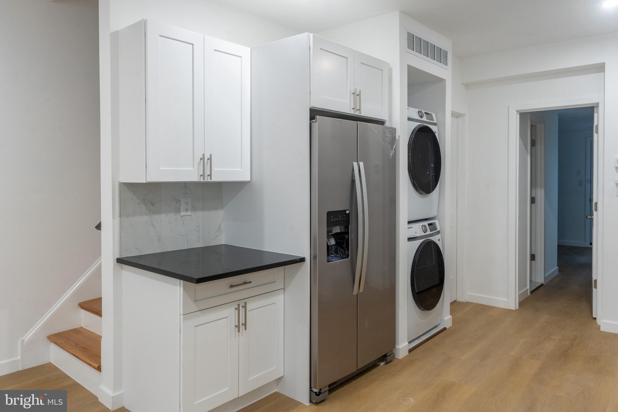 3631 Warren Street Philadelphia, PA 19104 - Photo 8 of 27 Modern kitchen with sleek appliances.