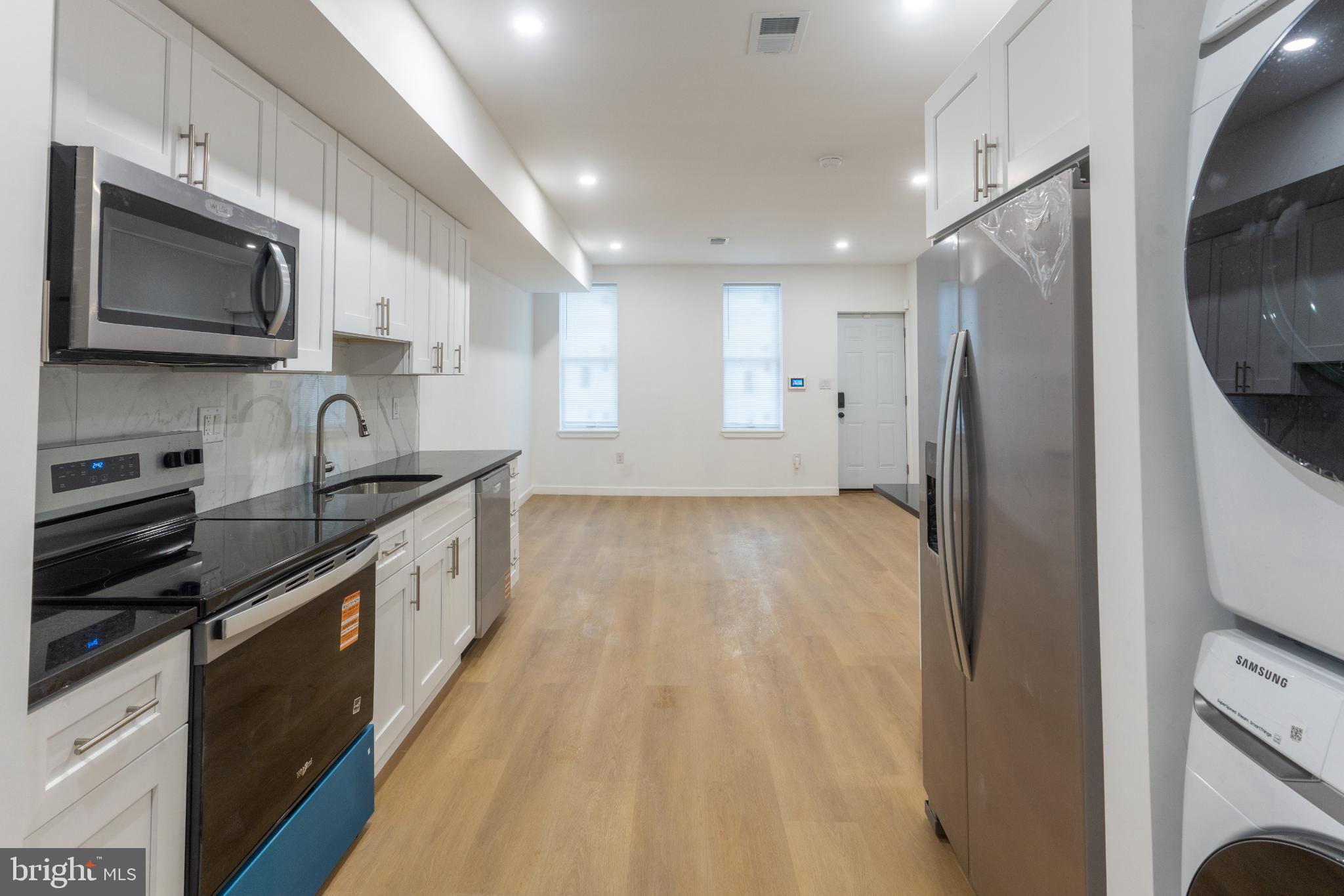 3631 Warren Street Philadelphia, PA 19104 - Photo 10 of 27 Modern kitchen with sleek finishes.