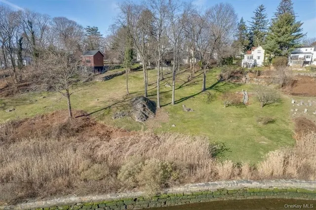 a view of a yard with an outdoor space