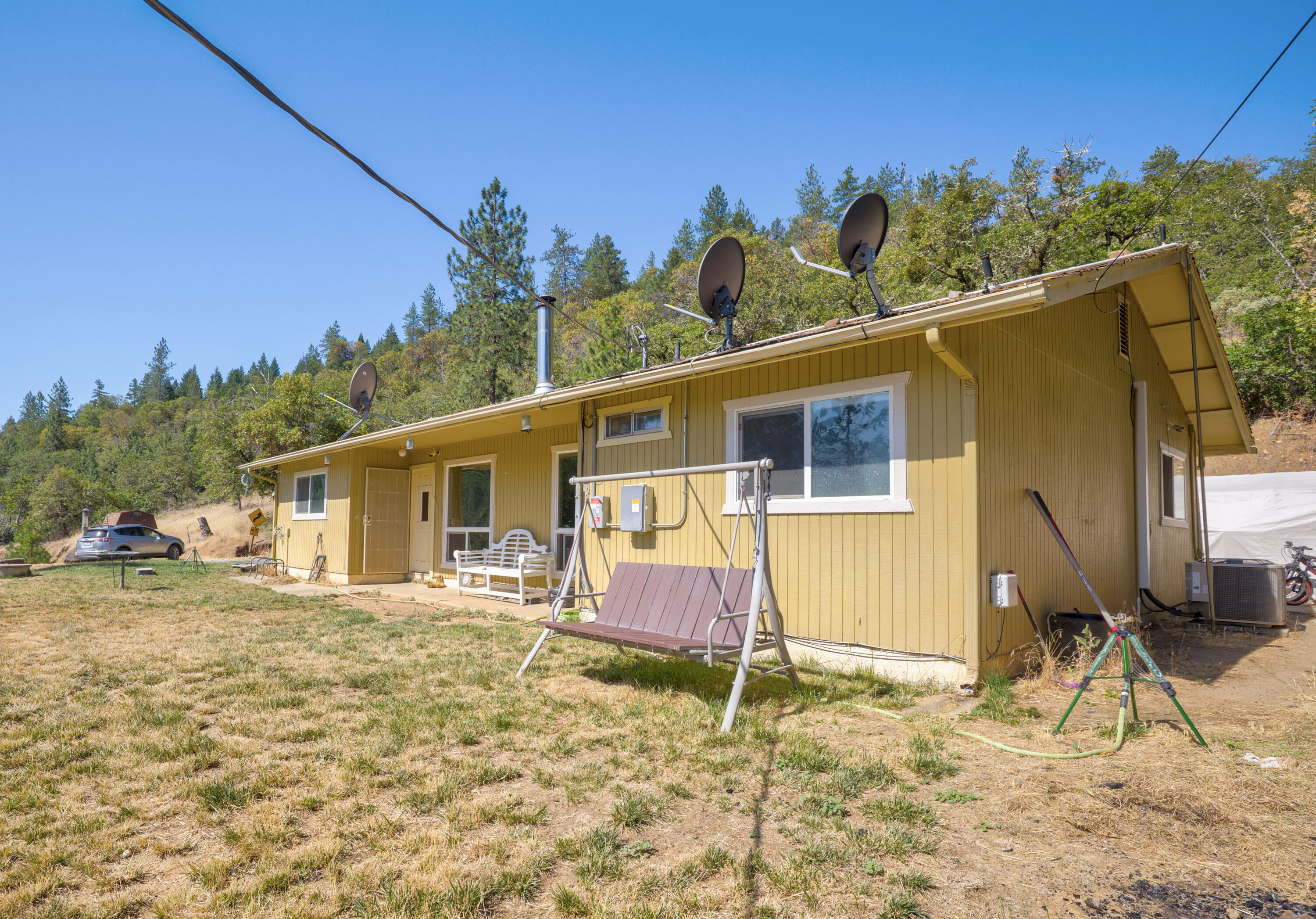 12748 Water Gap Road Williams, OR 97544 - Photo 25 of 35 a view of a house with a yard