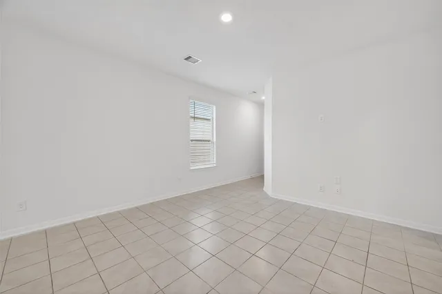 a view of an empty room with window