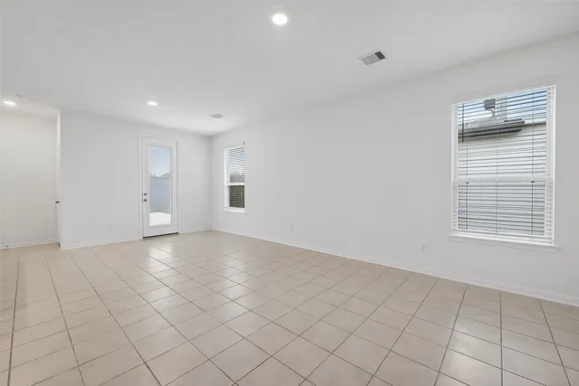a kitchen with granite countertop cabinets and stainless steel appliances