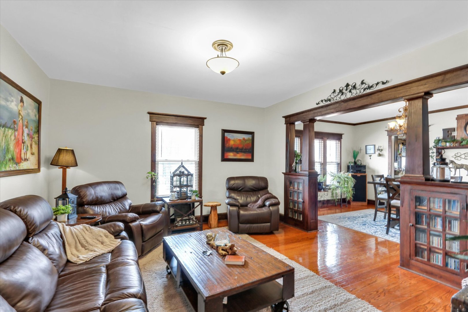 105 South Division Street Mahomet, IL 61853 - Photo 11 of 45 a living room with furniture potted plant and a large window