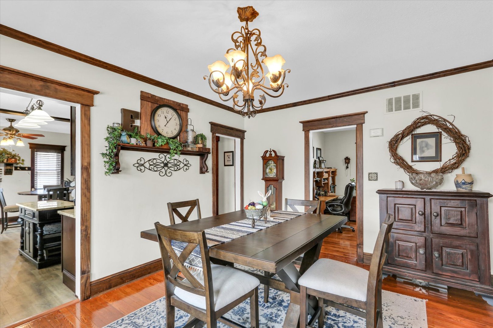 105 South Division Street Mahomet, IL 61853 - Photo 15 of 45 a view of a dining room with furniture and chandelier