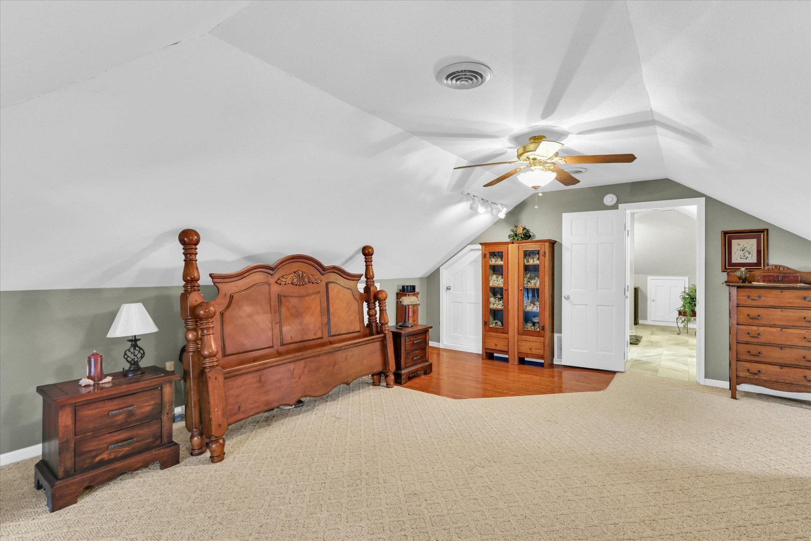 105 South Division Street Mahomet, IL 61853 - Photo 26 of 45 a bedroom with furniture and chandelier