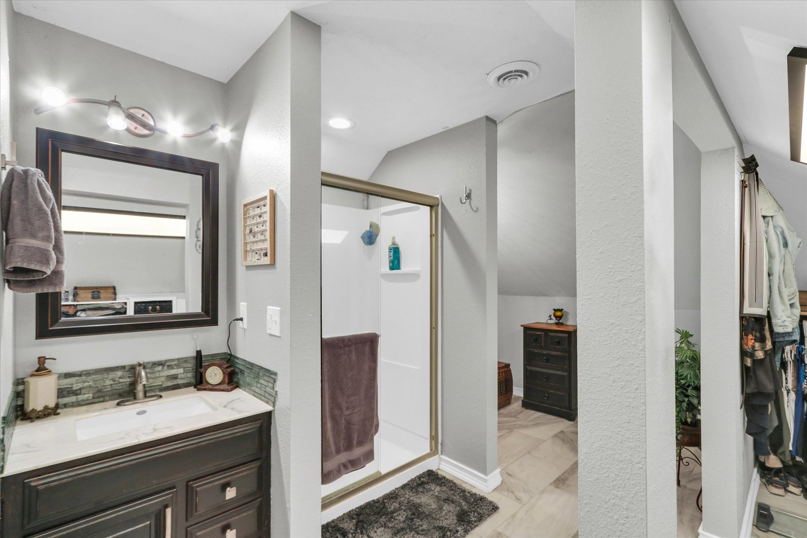 105 South Division Street Mahomet, IL 61853 - Photo 28 of 45 a spacious bathroom with a sink and a mirror