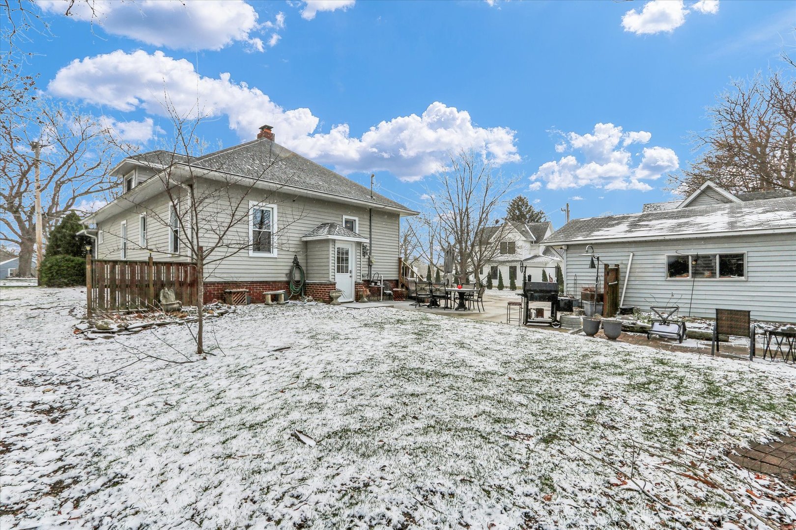 105 South Division Street Mahomet, IL 61853 - Photo 35 of 45 a view of a house with yard and sitting area