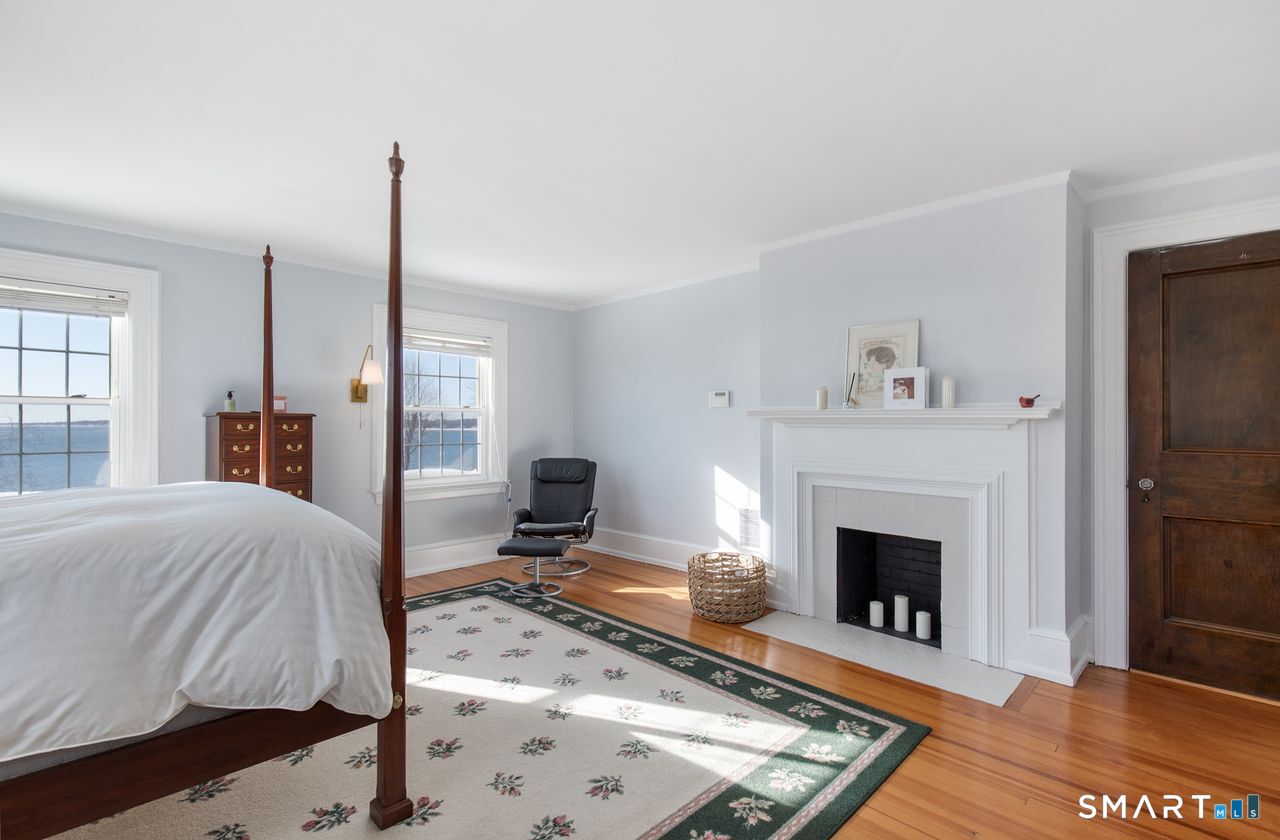 35 Point Lookout Milford, CT 06460 - Photo 21 of 31 Primary bedroom with fireplace