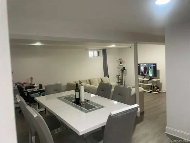 a kitchen with a table and chairs in it