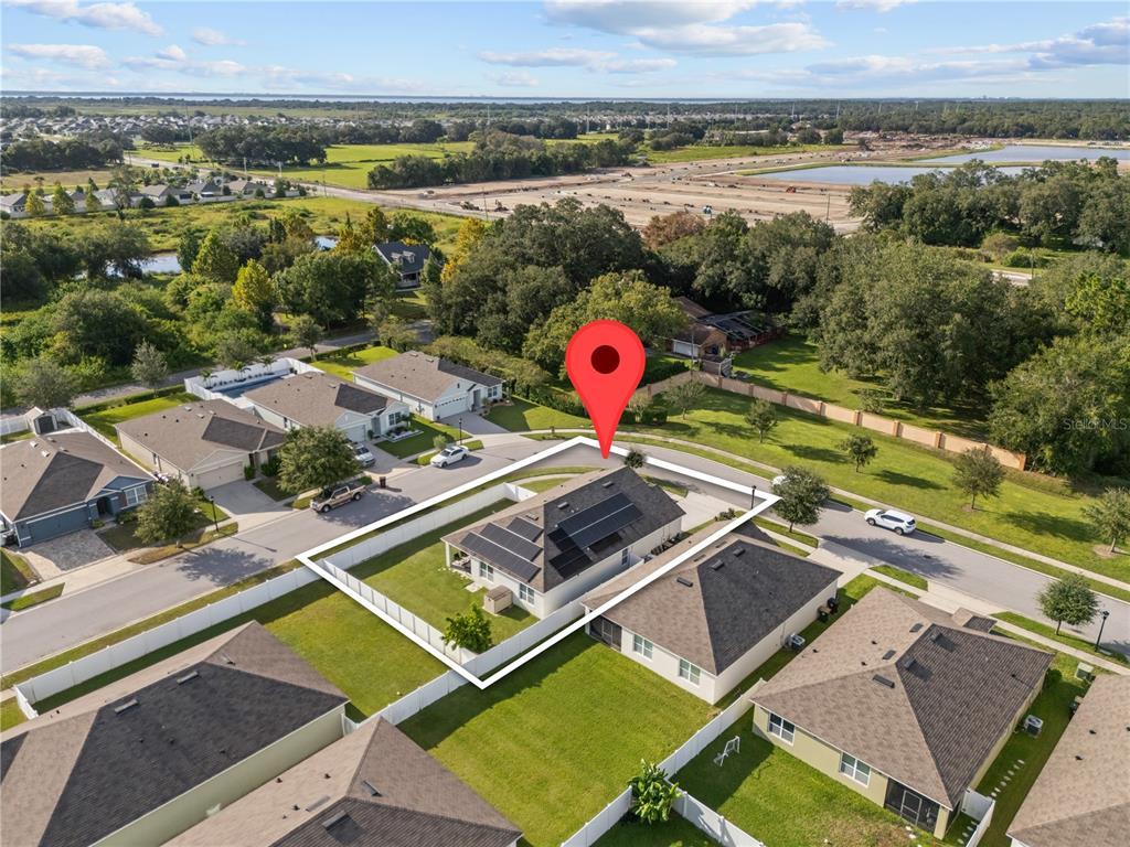 1833 Bluepoint Street St. Cloud, FL 34771 - Photo 3 of 46 an aerial view of a pool