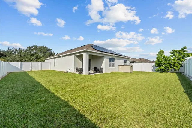 a front view of a house with patio