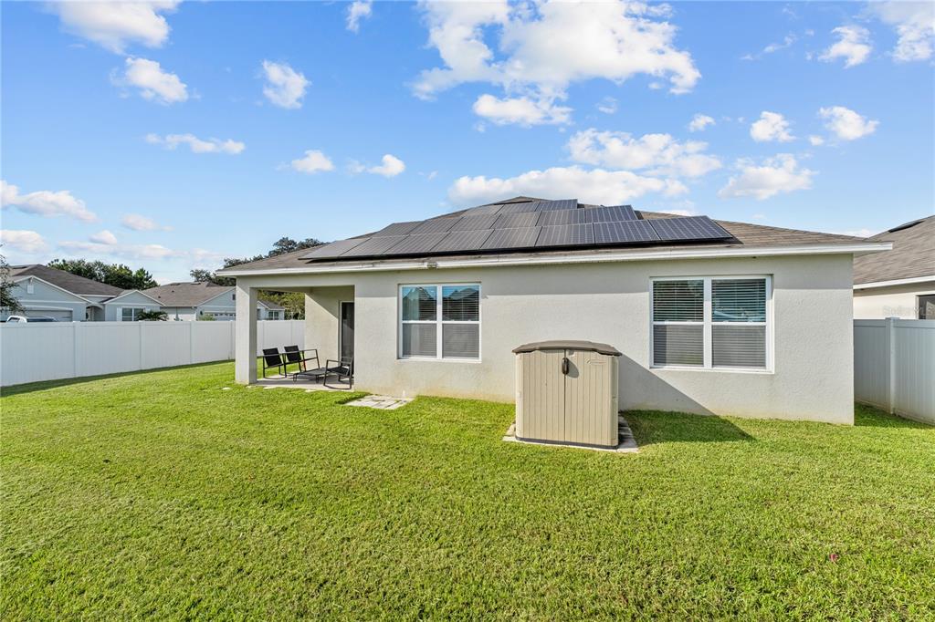 1833 Bluepoint Street St. Cloud, FL 34771 - Photo 46 of 46 a front view of a house with patio