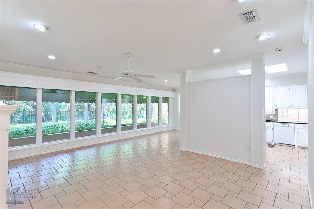 106 Riverside Park Abilene, TX 79605 - Photo 18 of 40 a view of empty room with wooden floor and fan