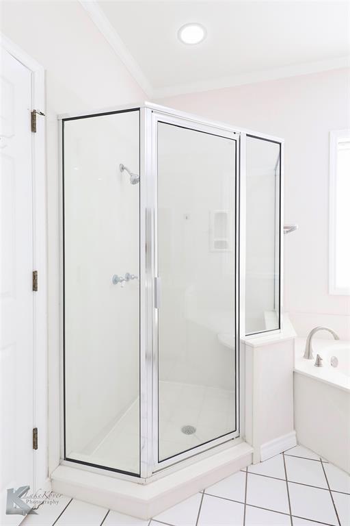 106 Riverside Park Abilene, TX 79605 - Photo 26 of 40 a bathroom with a shower and a glass door