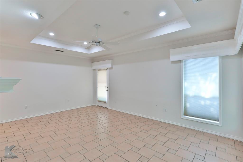 106 Riverside Park Abilene, TX 79605 - Photo 6 of 40 en empty room with windows