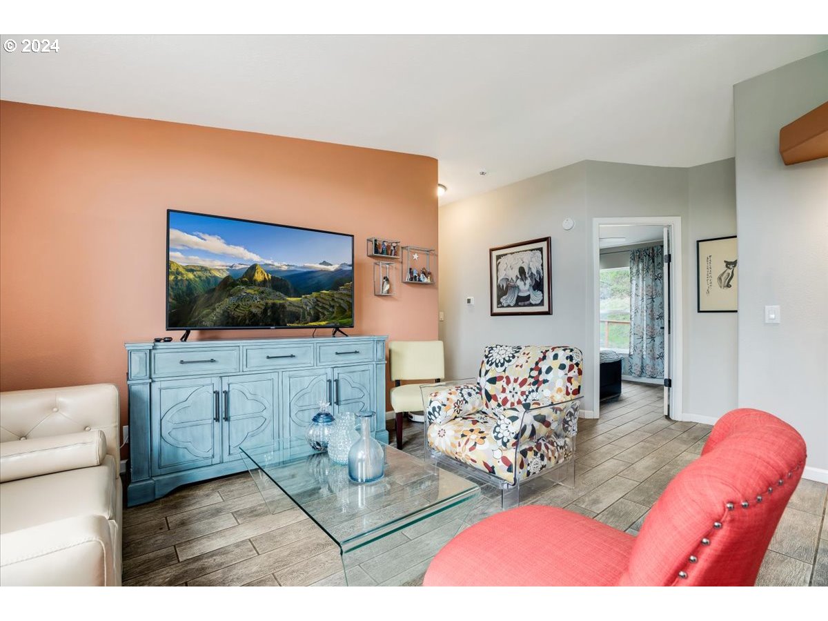 17771 Northwest Orchard View Road McMinnville, OR 97128 - Photo 11 of 36 a living room with furniture and a flat screen tv