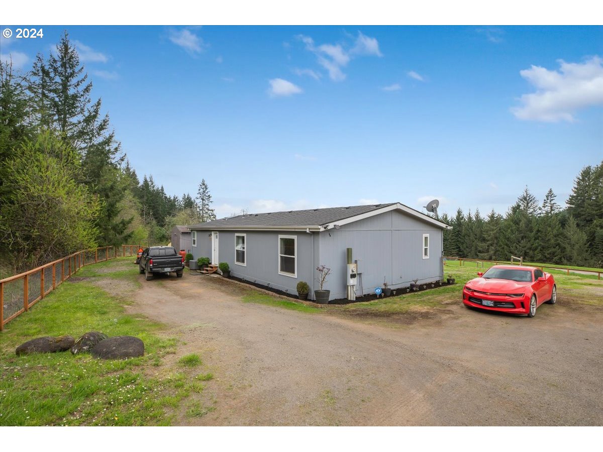 17771 Northwest Orchard View Road McMinnville, OR 97128 - Photo 28 of 36 a view of a house with truck parked