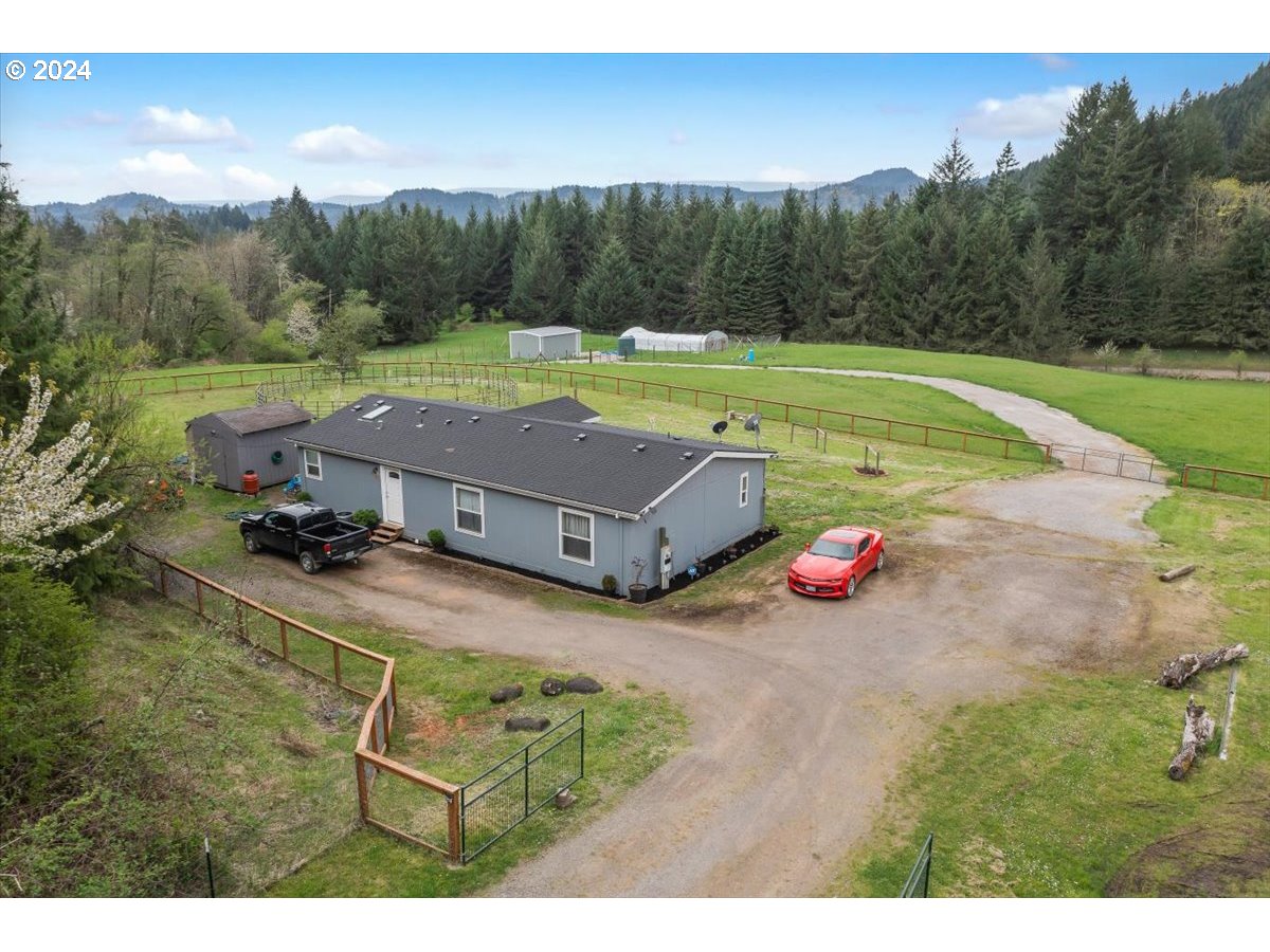 17771 Northwest Orchard View Road McMinnville, OR 97128 - Photo 30 of 36 a view of a tennis ground with a small yard