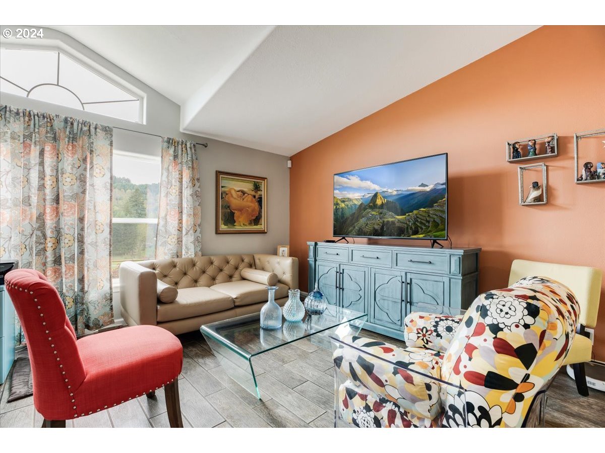 17771 Northwest Orchard View Road McMinnville, OR 97128 - Photo 10 of 36 a bedroom with furniture and a flat screen tv